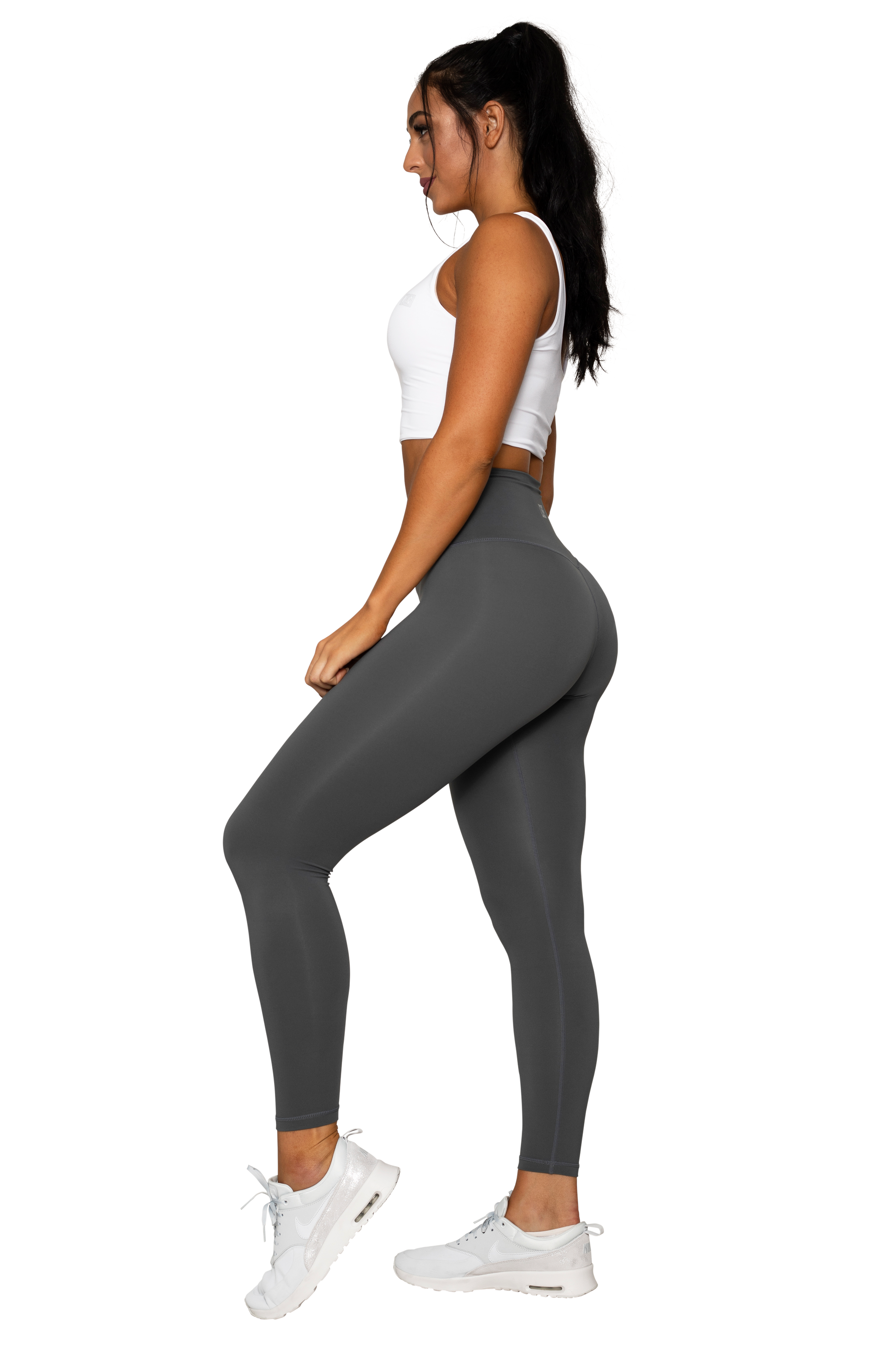 Women's charcoal grey active high rise capri leggings workout leggings. -  Flattening elasticized waistband with interior pocket and back zipper  pocket - Figure sculpting skinny leg design - Exterior side pocket along